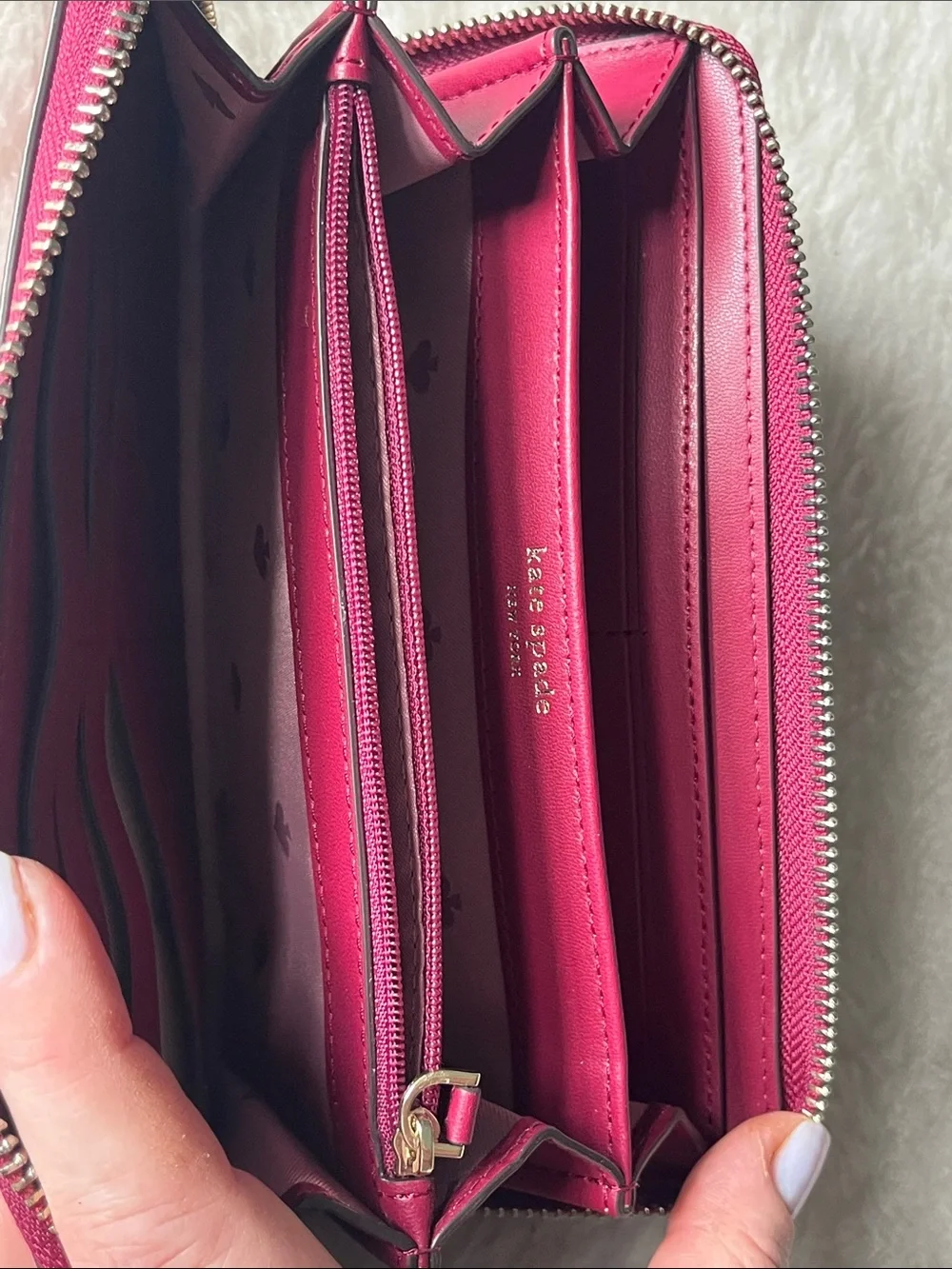 kate spade raspberry pebbled leather zip-around wallet